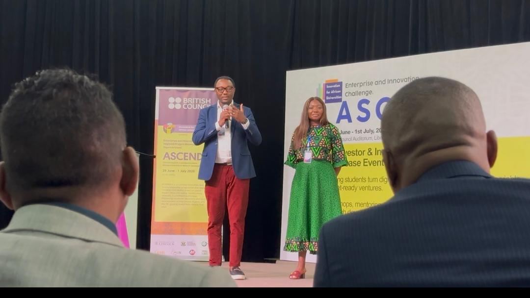 Presenting on stage at the Lion's Den
